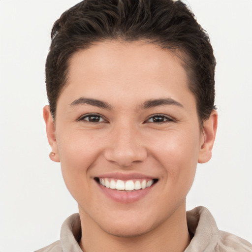 Joyful white young-adult female with short  brown hair and brown eyes