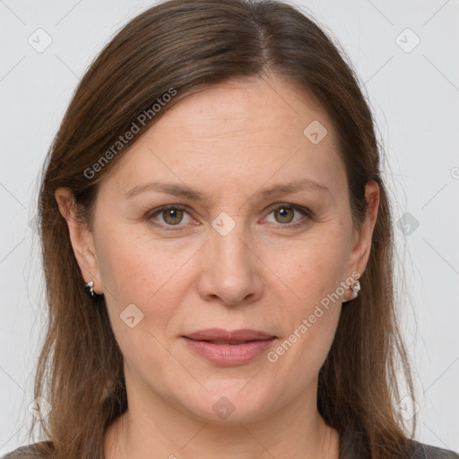 Joyful white adult female with medium  brown hair and grey eyes