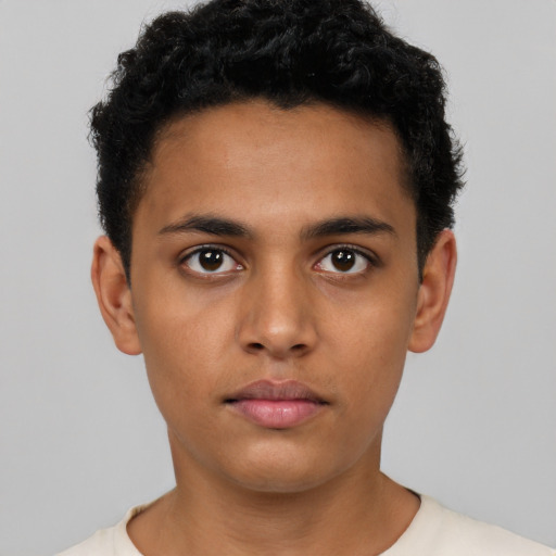 Neutral latino young-adult male with short  brown hair and brown eyes