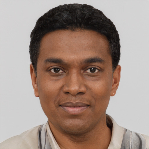 Neutral black young-adult male with short  black hair and brown eyes