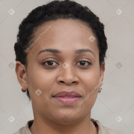 Joyful black young-adult female with short  brown hair and brown eyes