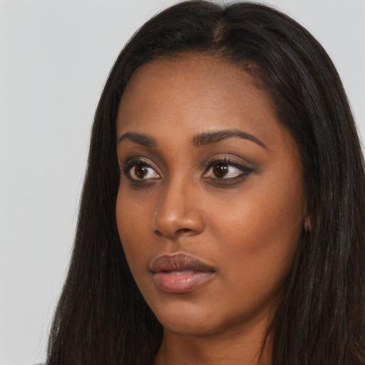 Neutral asian young-adult female with long  brown hair and brown eyes