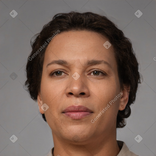 Joyful white adult female with short  brown hair and brown eyes