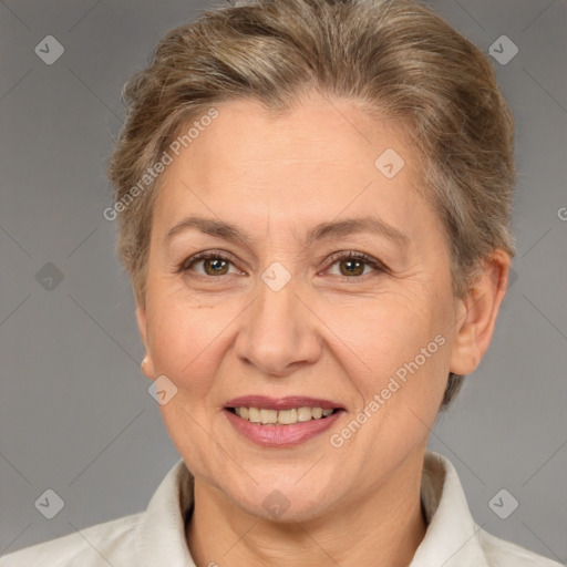 Joyful white adult female with short  brown hair and brown eyes