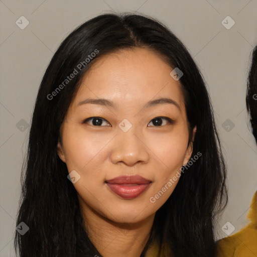 Joyful asian young-adult female with long  brown hair and brown eyes