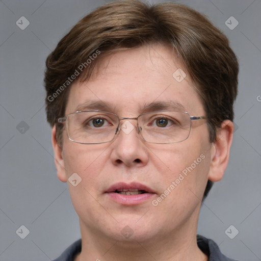 Joyful white adult male with short  brown hair and grey eyes