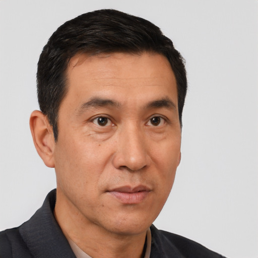Neutral white adult male with short  black hair and brown eyes