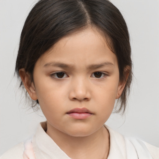 Neutral asian child female with medium  brown hair and brown eyes