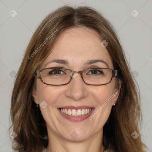 Joyful white adult female with medium  brown hair and brown eyes