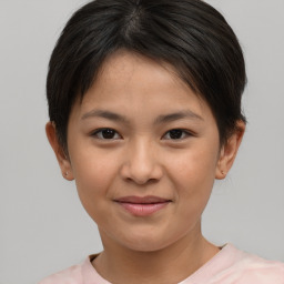 Joyful white child female with short  brown hair and brown eyes