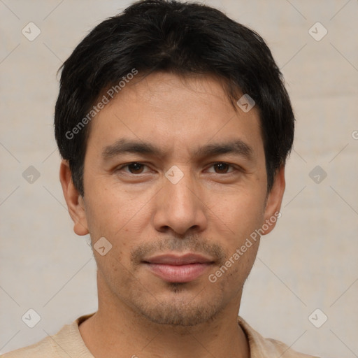 Joyful white young-adult male with short  black hair and brown eyes