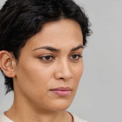 Neutral latino young-adult female with short  brown hair and brown eyes