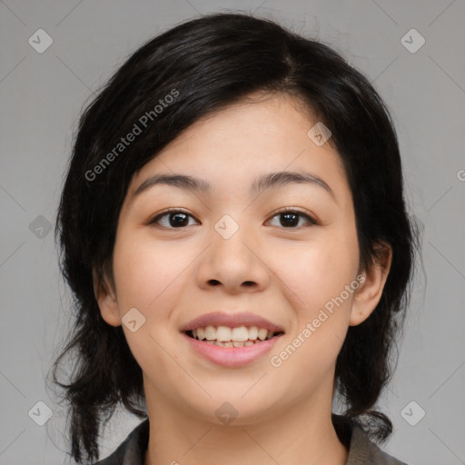 Joyful asian young-adult female with medium  black hair and brown eyes