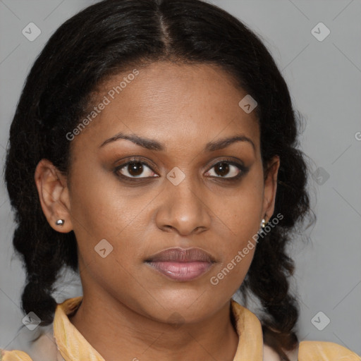 Joyful black young-adult female with medium  brown hair and brown eyes