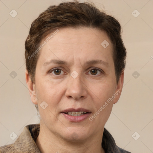 Joyful white adult female with short  brown hair and brown eyes