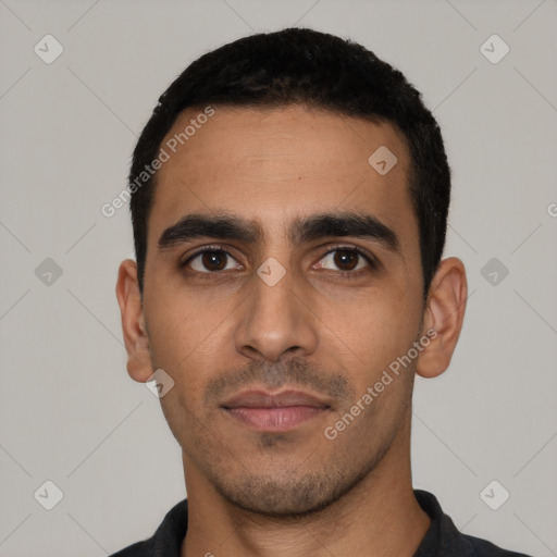 Neutral latino young-adult male with short  black hair and brown eyes
