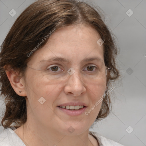 Joyful white adult female with medium  brown hair and brown eyes