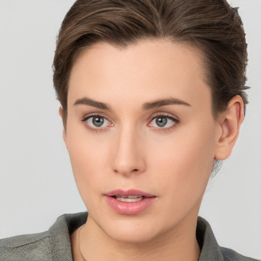 Neutral white young-adult female with short  brown hair and brown eyes