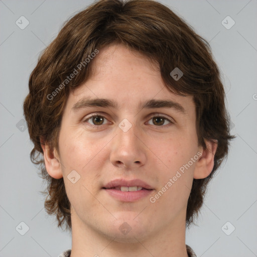 Joyful white young-adult male with medium  brown hair and brown eyes