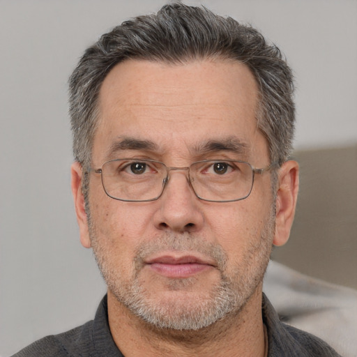 Neutral white middle-aged male with short  brown hair and brown eyes