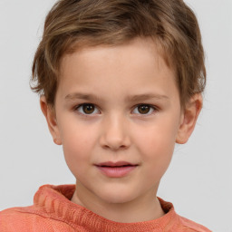 Joyful white child male with short  brown hair and brown eyes