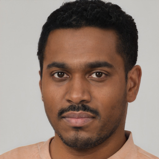 Neutral black young-adult male with short  black hair and brown eyes