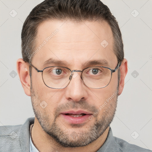 Neutral white adult male with short  brown hair and brown eyes