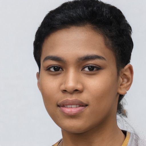 Joyful latino young-adult female with short  black hair and brown eyes