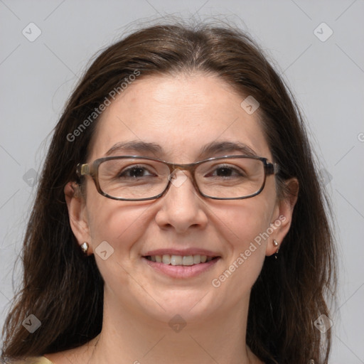 Joyful white adult female with medium  brown hair and brown eyes