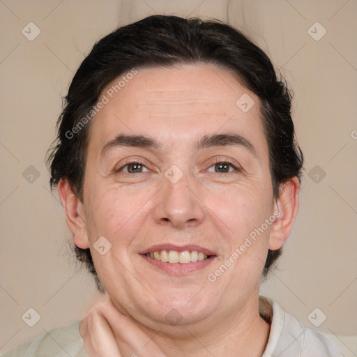 Joyful white adult male with medium  brown hair and brown eyes