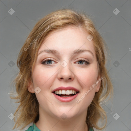 Joyful white young-adult female with medium  brown hair and blue eyes