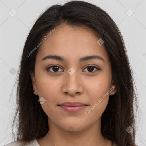 Joyful latino young-adult female with long  brown hair and brown eyes