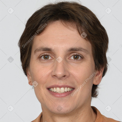 Joyful white adult female with short  brown hair and grey eyes