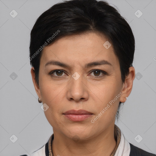 Joyful white adult female with medium  brown hair and brown eyes