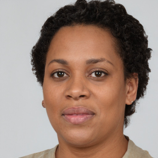 Neutral black adult female with short  brown hair and brown eyes