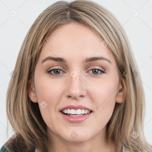 Joyful white young-adult female with medium  brown hair and grey eyes