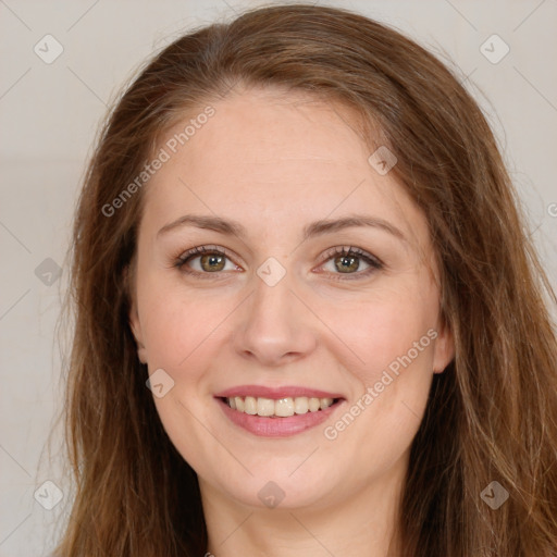 Joyful white young-adult female with long  brown hair and green eyes