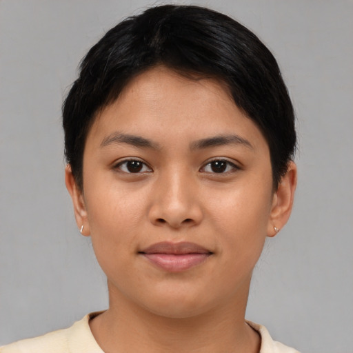 Joyful asian young-adult female with short  brown hair and brown eyes