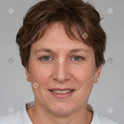 Joyful white adult female with short  brown hair and brown eyes