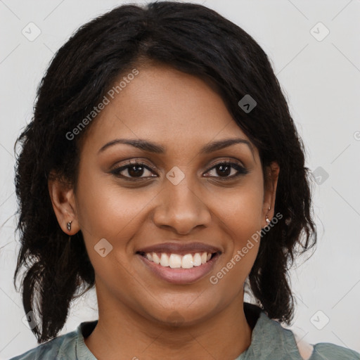 Joyful black young-adult female with medium  brown hair and brown eyes