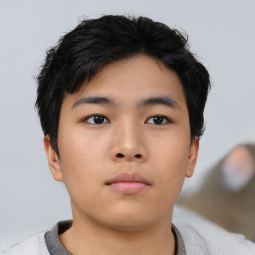 Neutral asian young-adult male with short  black hair and brown eyes