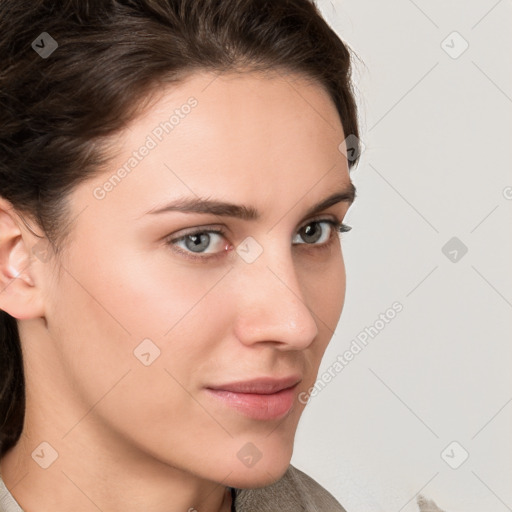 Neutral white young-adult female with medium  brown hair and brown eyes