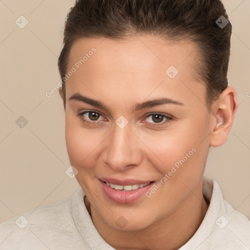 Joyful white young-adult female with short  brown hair and brown eyes