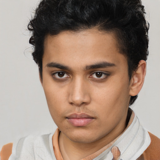 Neutral latino young-adult male with short  brown hair and brown eyes