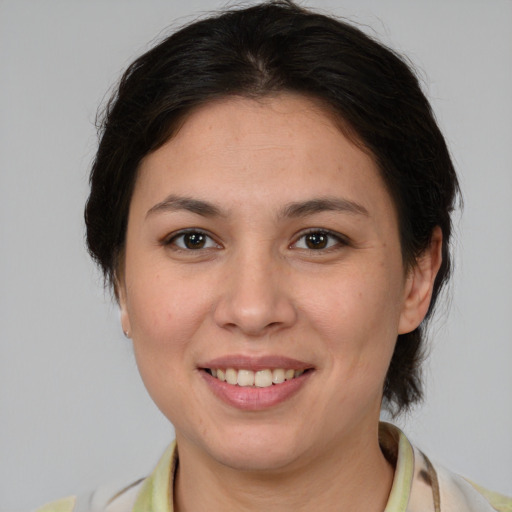 Joyful white young-adult female with medium  brown hair and brown eyes