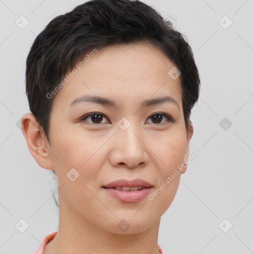 Joyful asian young-adult female with short  brown hair and brown eyes