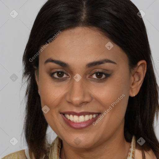 Joyful white young-adult female with long  brown hair and brown eyes