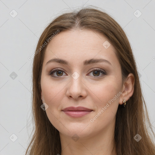 Joyful white young-adult female with long  brown hair and grey eyes