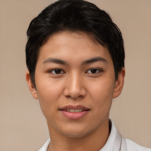 Joyful asian young-adult female with short  brown hair and brown eyes