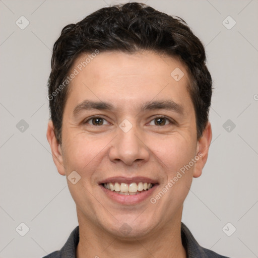 Joyful white young-adult male with short  black hair and brown eyes